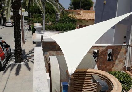 Tensioned shade sails